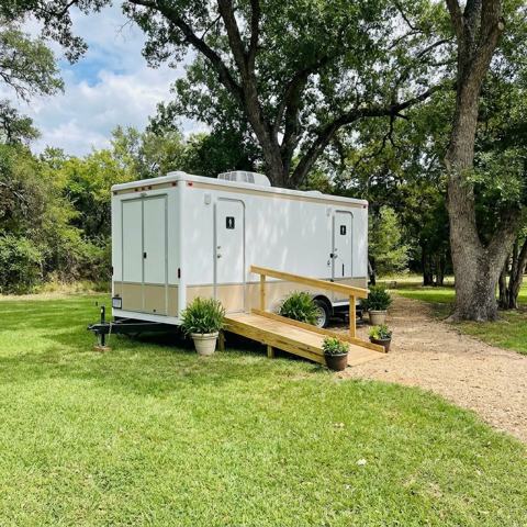 Wedding restroom rental at an outdoor venue in Austin, Texas